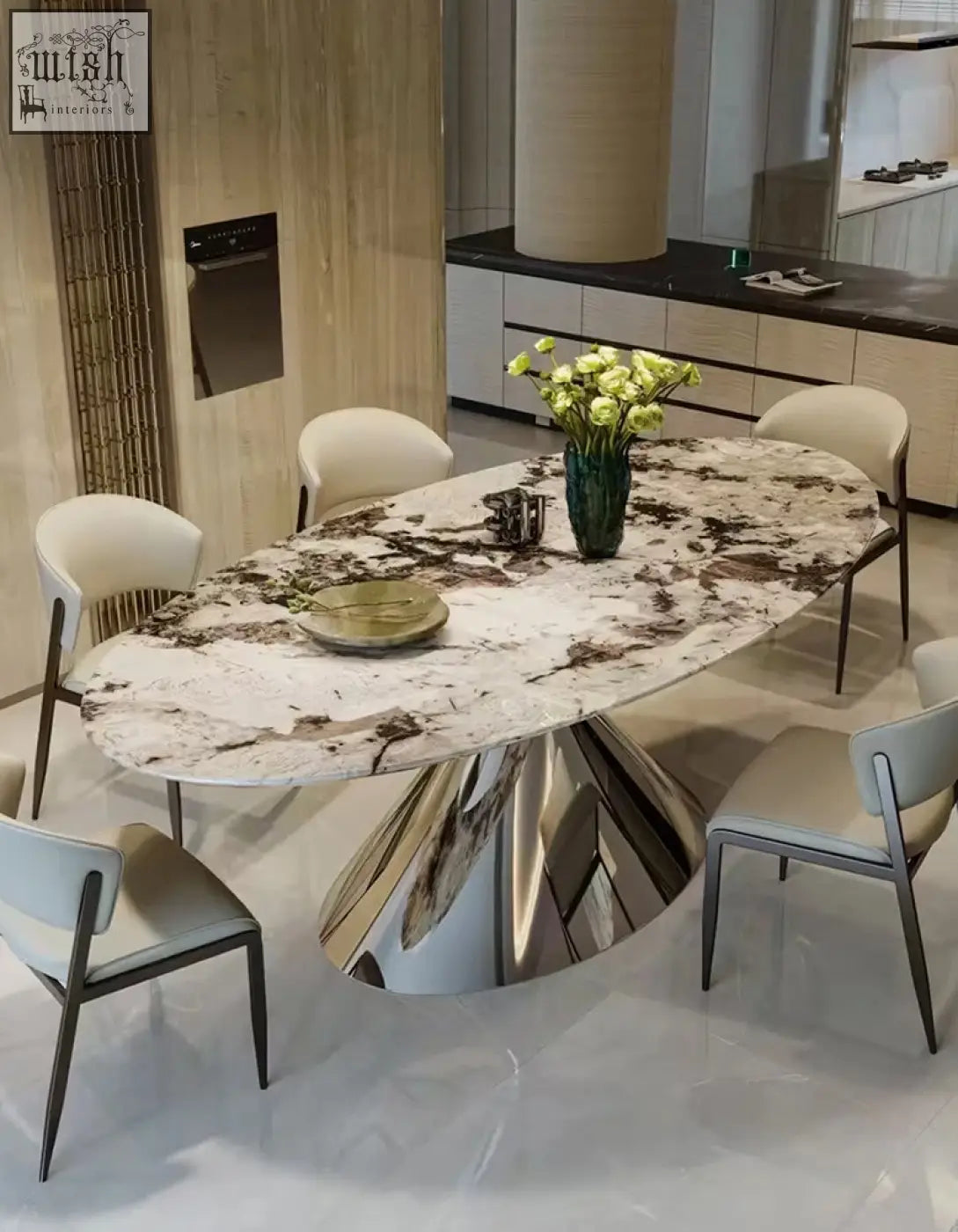 Osim oval dining table with white and brown marble top and sleek mirrored chrome pedestal base for elegant oval dining