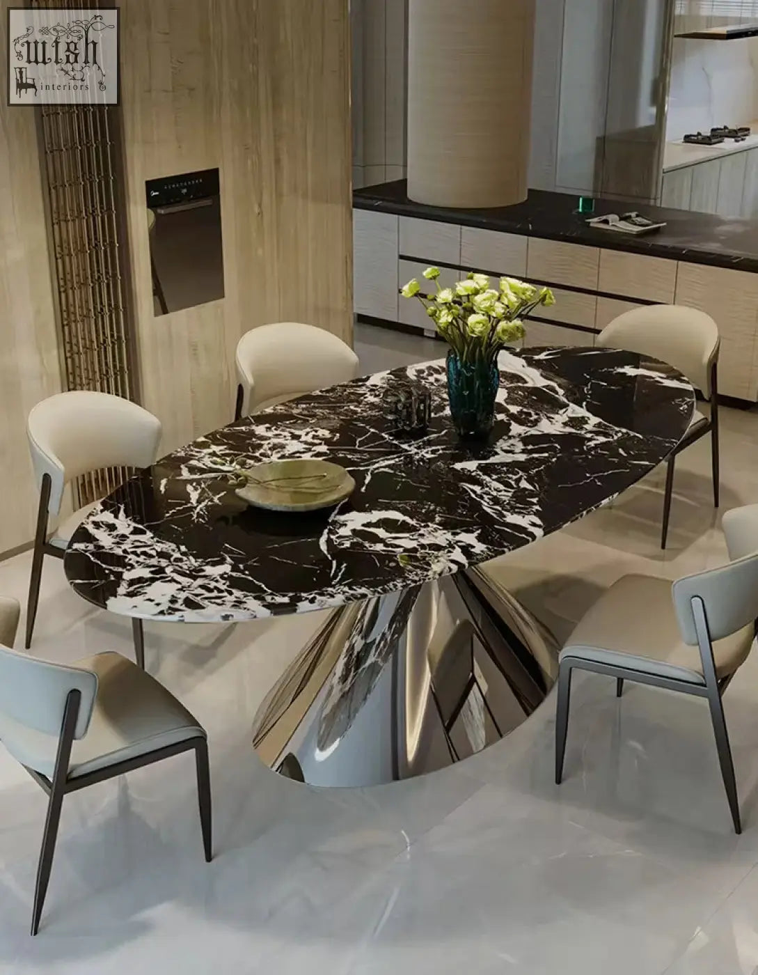 Osim oval dining table with a black and white marble top and sleek chrome pedestal base elegant oval dining design