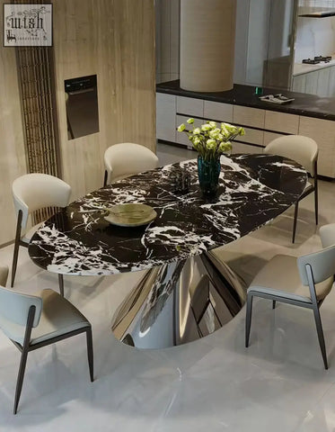 Osim oval dining table with a black and white marble top and sleek chrome pedestal base elegant oval dining design