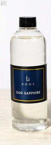 Clear glass reed diffuser refill bottle with black cap navy blue label gold trim for lifestyle home oud sapphire