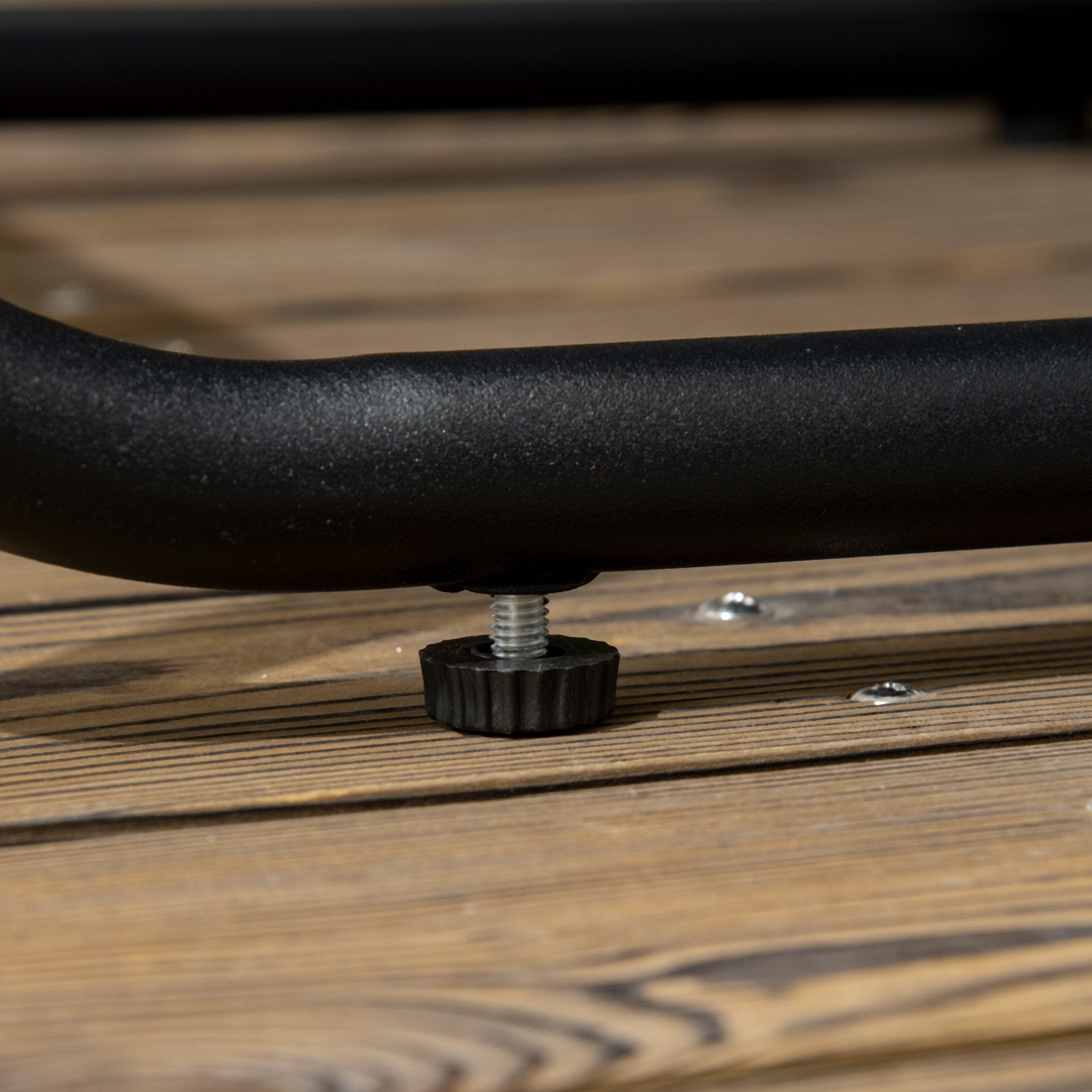 Black metal pipe with textured finish and adjustment knob on outsunny rattan dining set wood grain plastic table