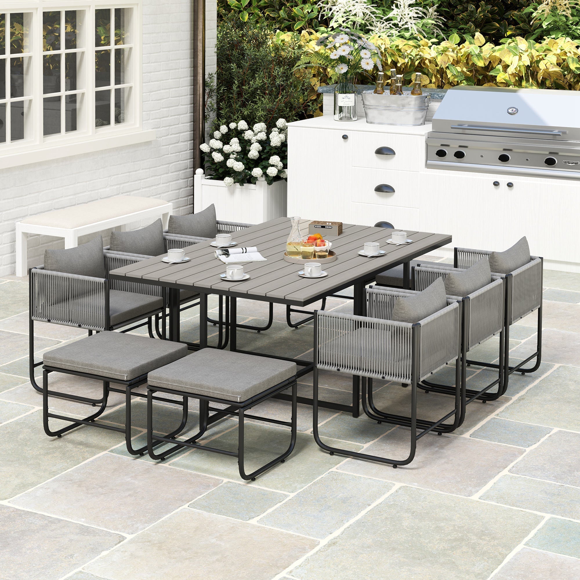 Outsunny 10 seater gray rattan outdoor dining set with cushioned woven rope chairs and wood grain plastic top table