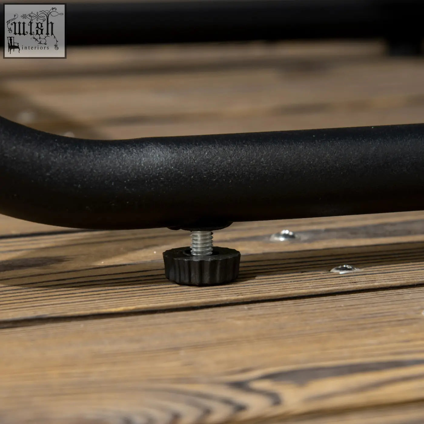 Black metal pipe with textured finish and adjustment knob on outsunny 10 seater rattan set with wood grain plastic table top