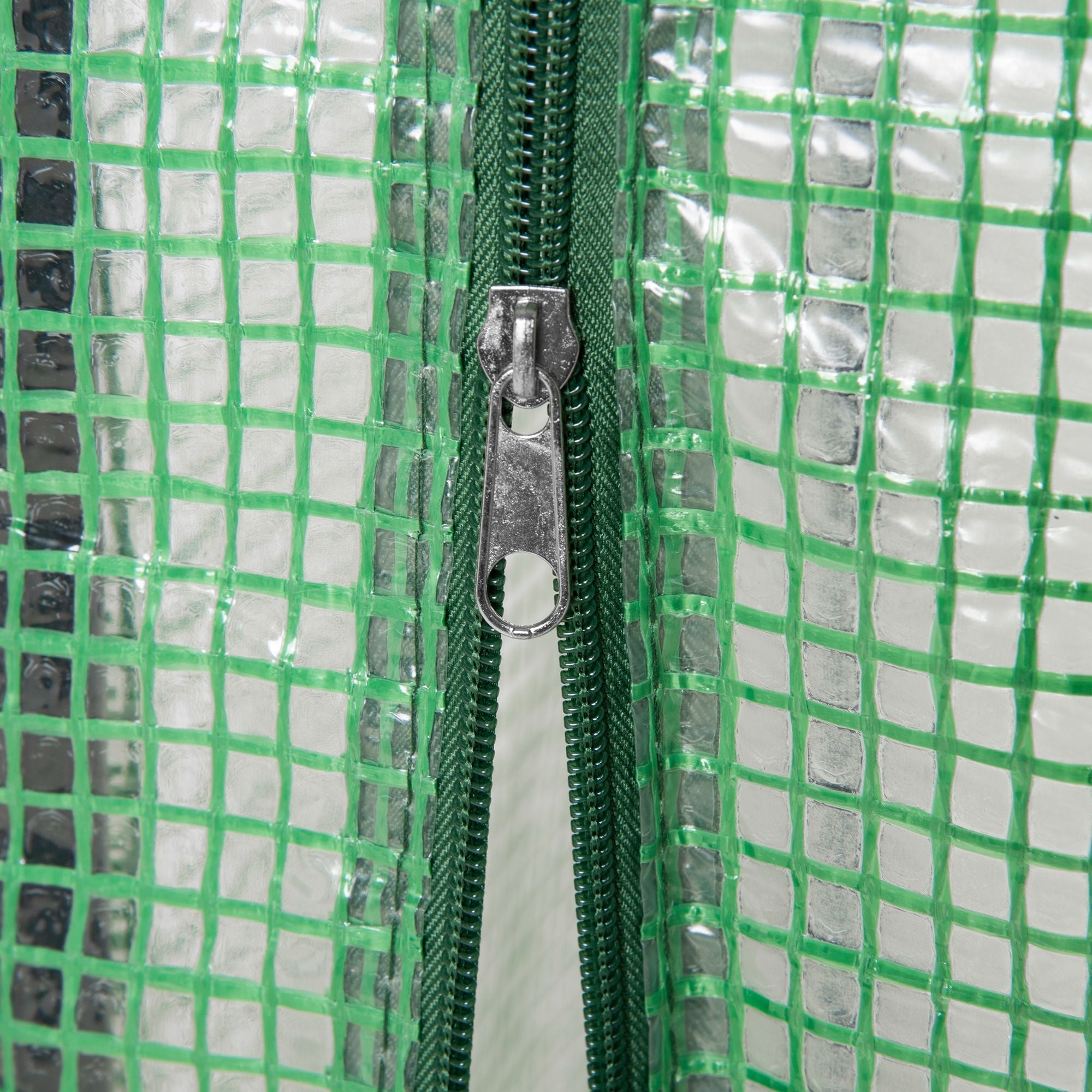 Green mesh plastic cover with silver zipper on outsunny steel frame greenhouse for outdoor spaces