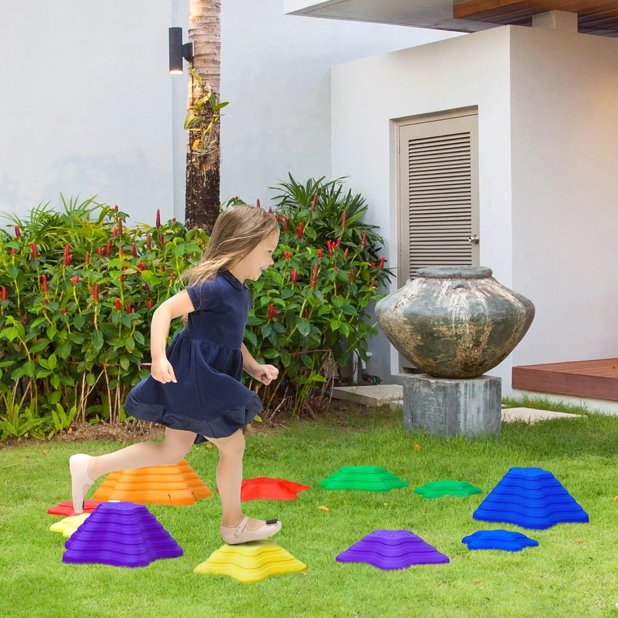 Colorful plastic balance stepping stones scattered on grass for kids outdoor indoor balance play and obstacle course fun