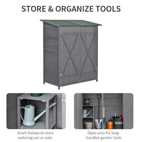 Gray wooden outsunny garden storage shed with green asphalt roof and x-shaped door panels for outdoor storage