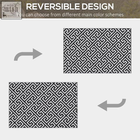 Out sunny black and white reversible geometric outdoor rug made of plastic straw for road tour and camping use