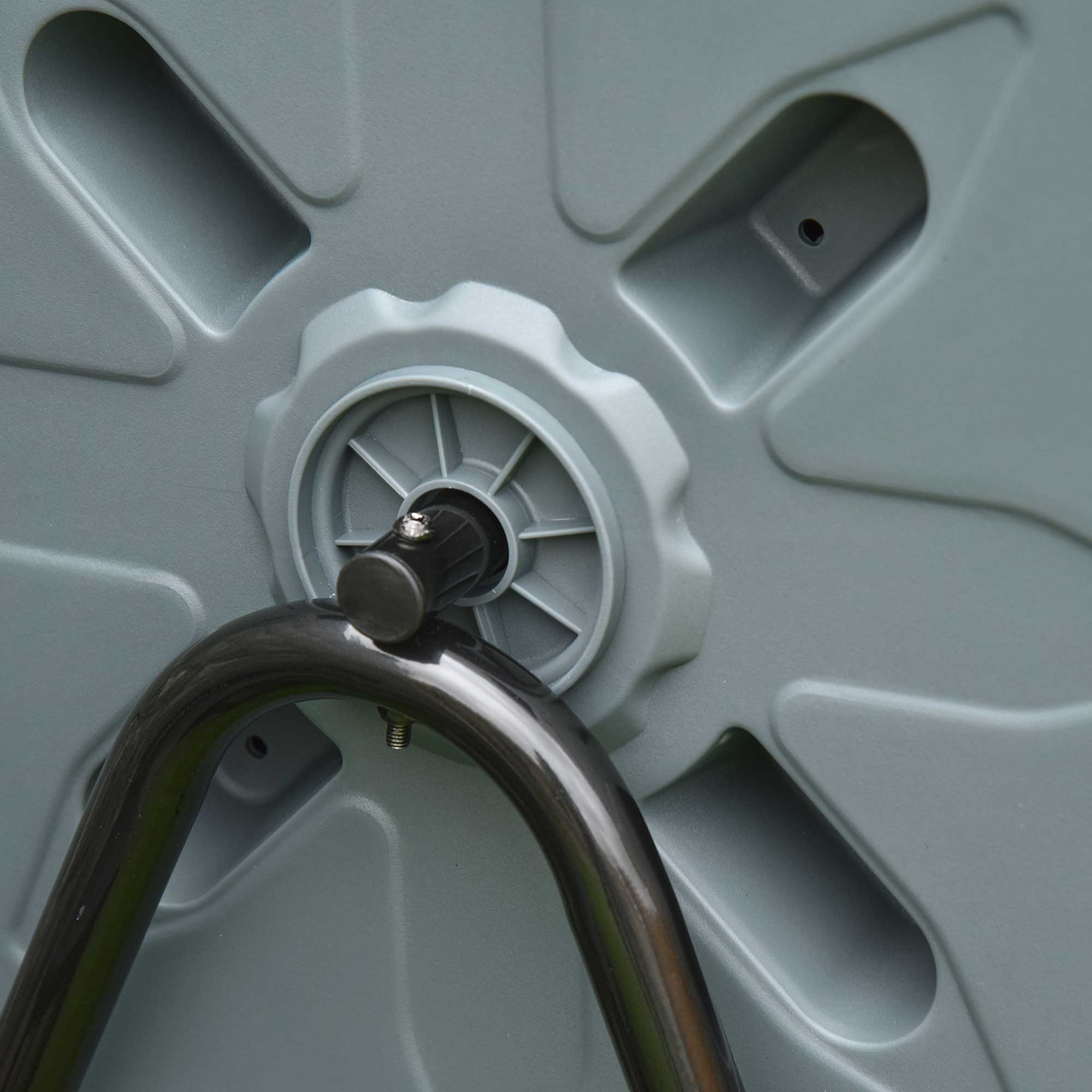 Gray plastic wheel with metallic hub and bolt on the back of outsunny 160l 360° rotating dual chamber compost bin
