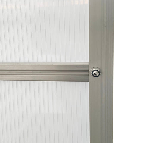 Silver framed aluminium frame walk in polycarbonate greenhouse door with translucent ribbed panels and metallic track