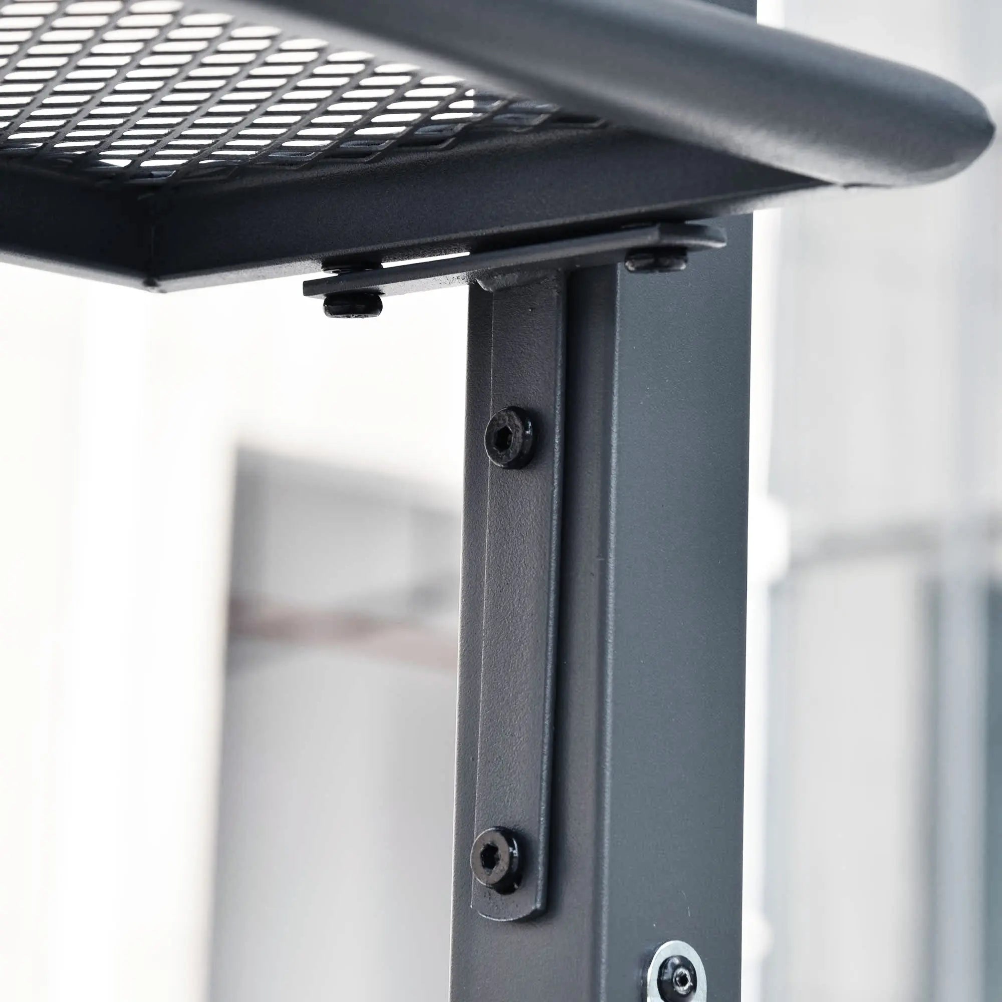 Black metal mesh shelf supported by matte steel frame with screws in grey outsunny bbq gazebo with bottle opener