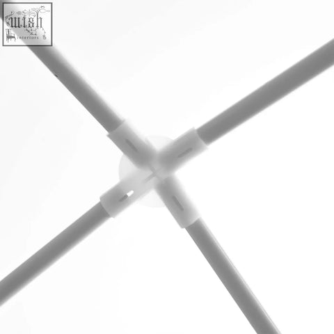 White plastic connector joining four steel frame poles of outsunny 2.7m garden gazebo with guy ropes and ground stakes