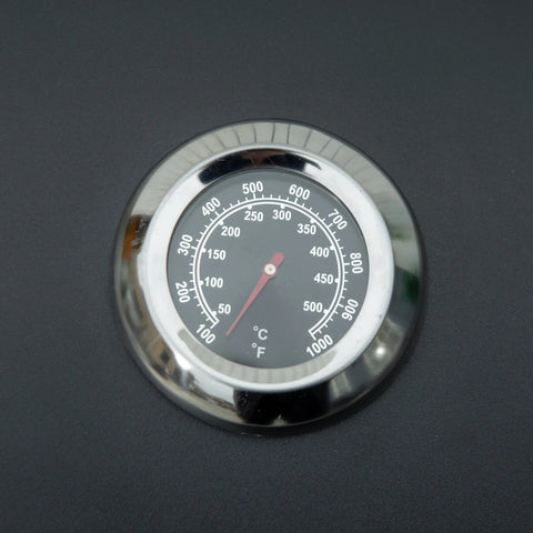 Chrome-finished circular grill thermometer with black face and red needle on outsunny carbon steel portable 2 burner grill net