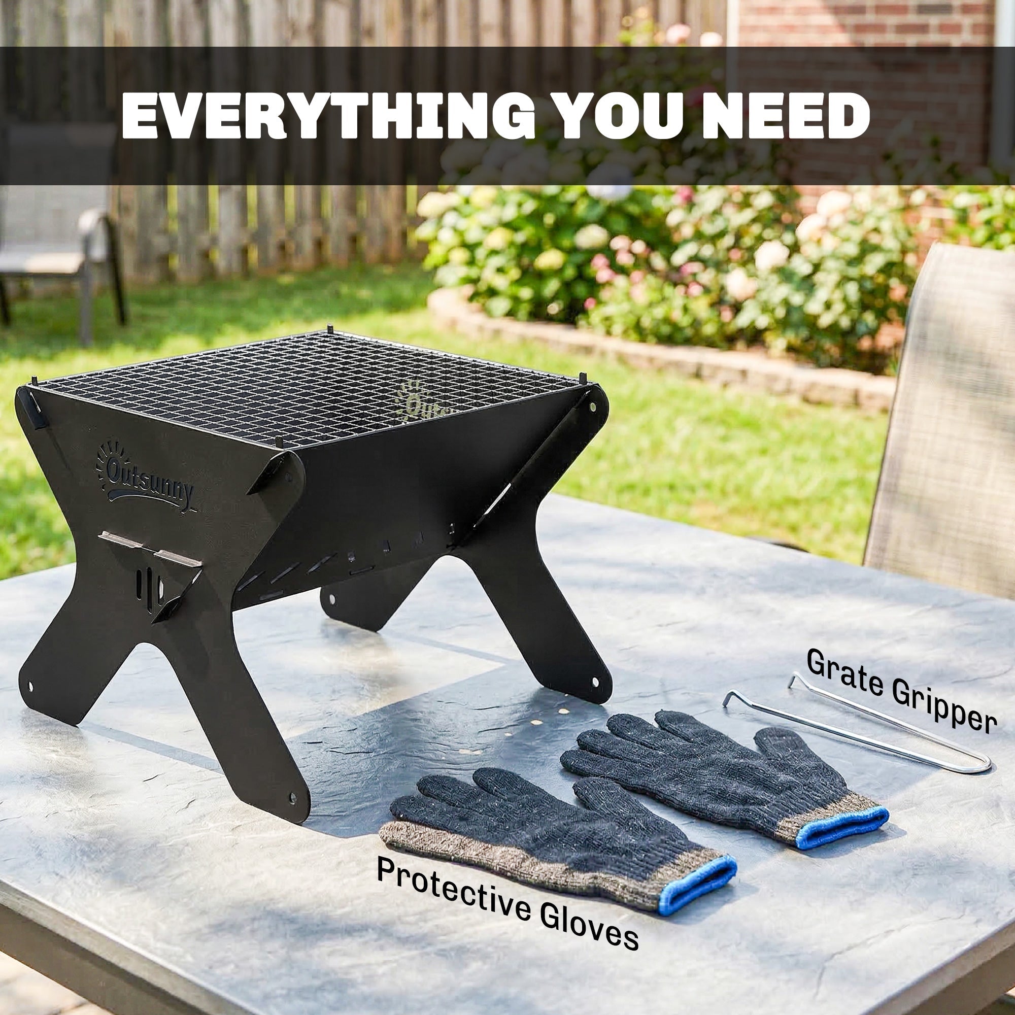 Black metal x-frame bbq grill with grill grate, branded logo, and carry bag for portable outdoor cooking