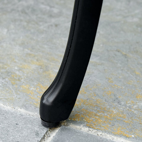 Black leather chair leg with curved line design and subtle stitching on outsunny cast aluminium garden bench