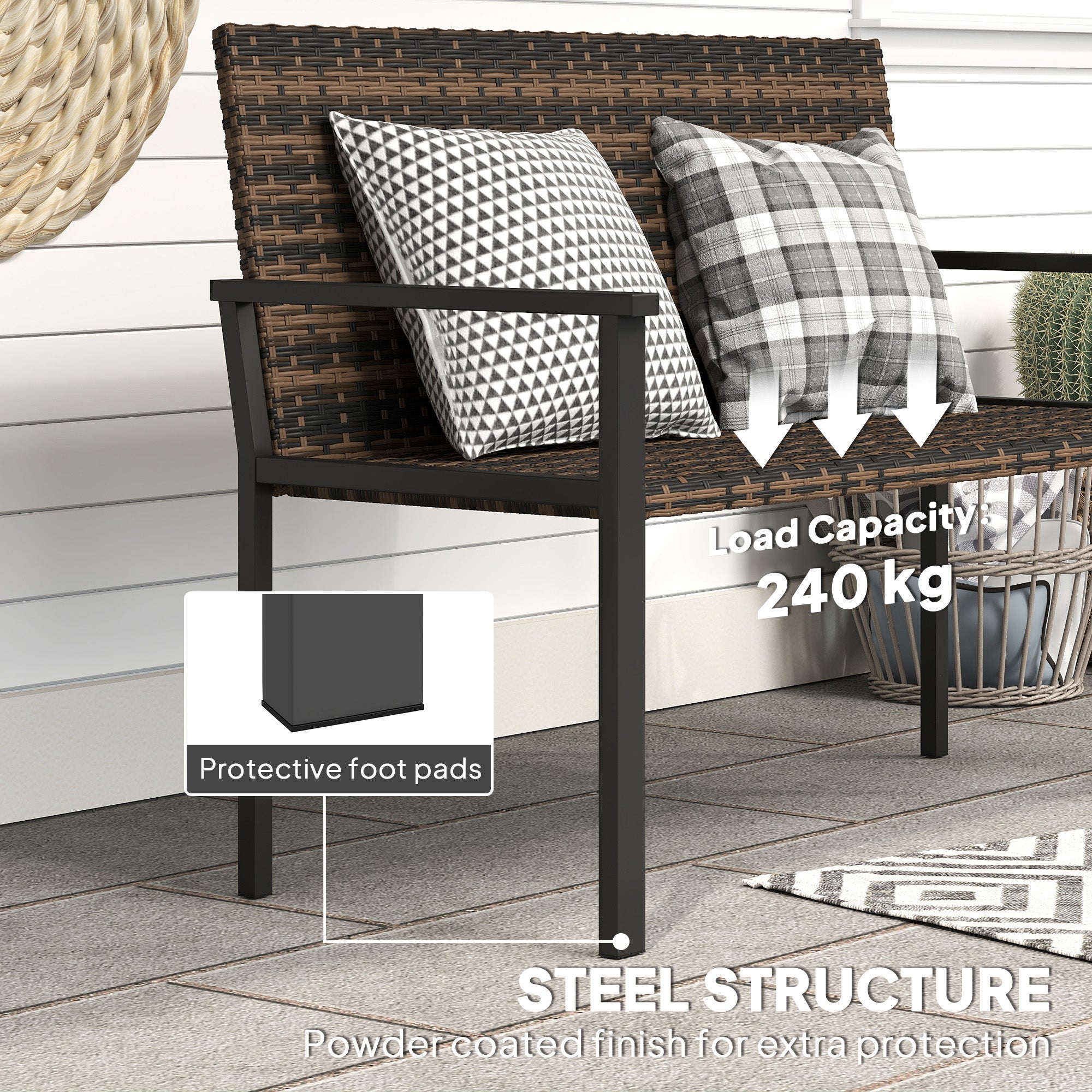 Black steel frame two-seater garden bench with brown woven wicker seat and patterned throw pillows for outdoor use