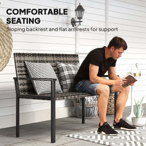 Black wicker two-seater garden bench with steel frame and patterned throw pillows for patio or park use