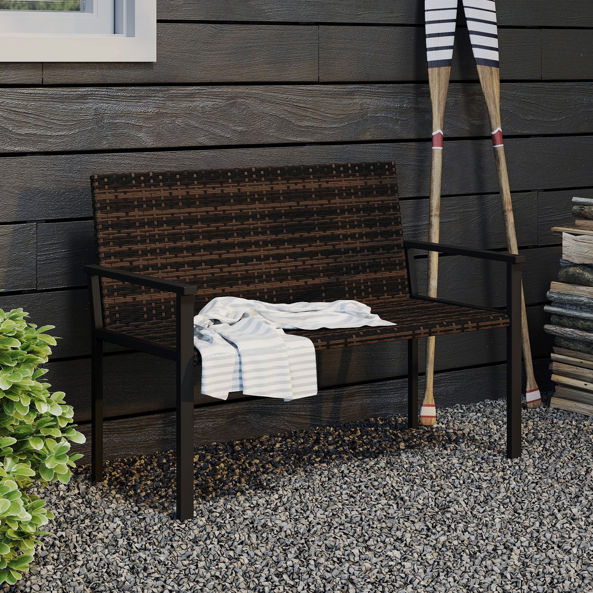 Dark brown woven wicker two-seater garden bench with steel frame and quick-drying cotton padding for outdoor use
