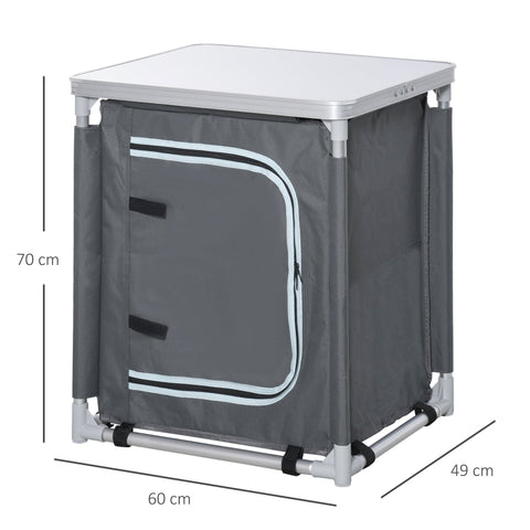 Gray fabric camping kitchen table with silver metal frame and white-trimmed front panel 52l x 42w for outdoor use
