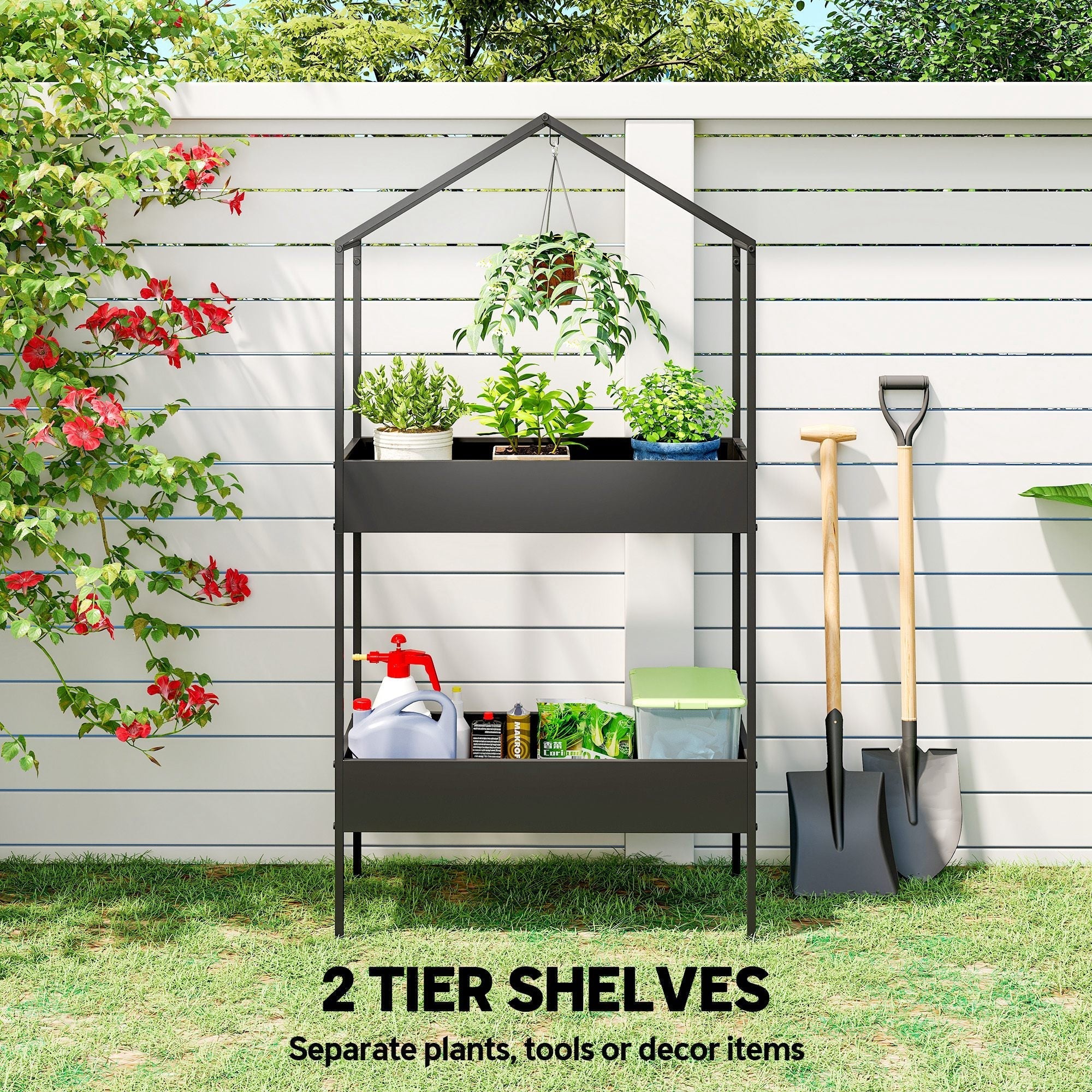 Black metal two tier plant stand with hook allows for grow lights in a house-shaped frame for indoor outdoor use