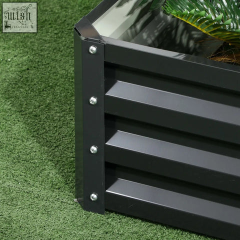 Black corrugated metal raised garden bed with glass top made of galvanised steel for veggies and herbs garden bed