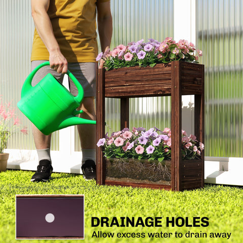 Dark brown fir wood raised planter with two tiers and drainage holes holding pink and purple petunias garden bed