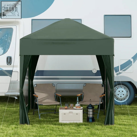Dark green outsunny 2x2 m pop up gazebo with steel frame and side curtains set up outdoors near an rv with carry bag