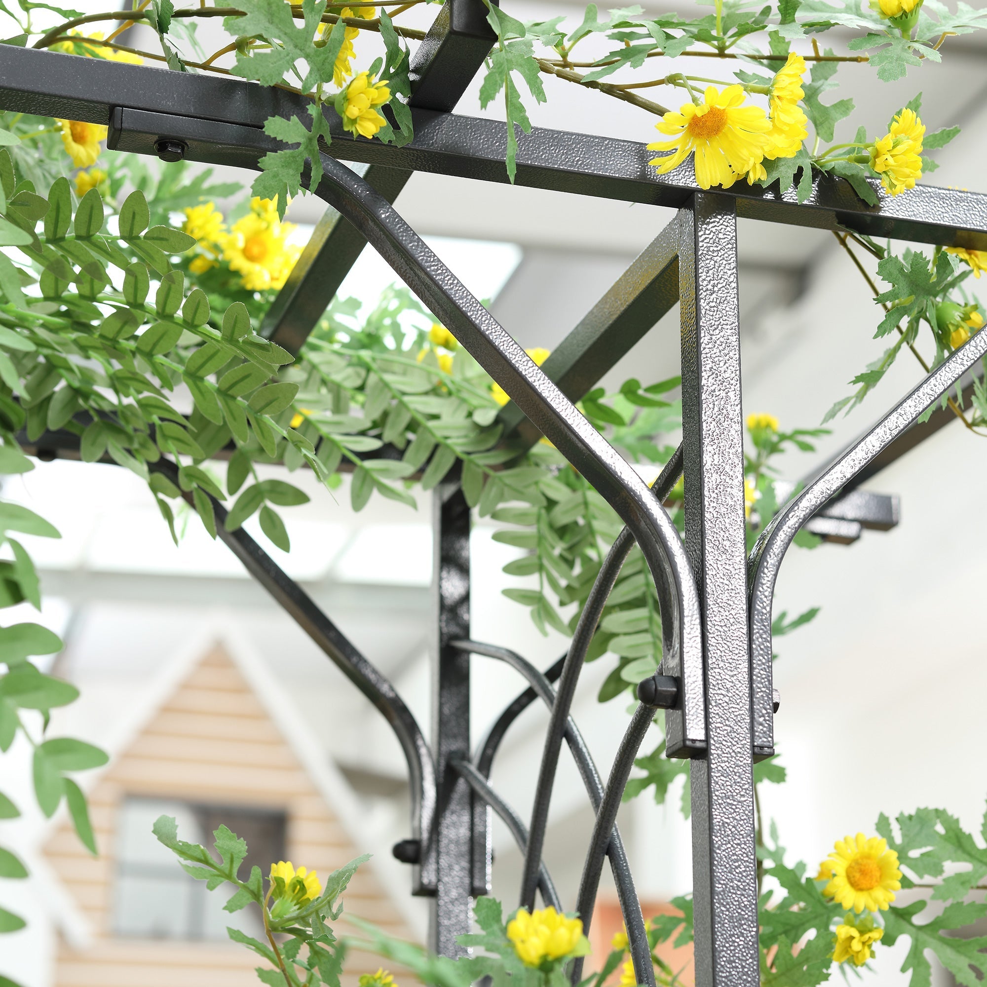 Black wrought iron Outsunny 210cm garden trellis arch with elegant scrollwork climbing vines and rustic charm