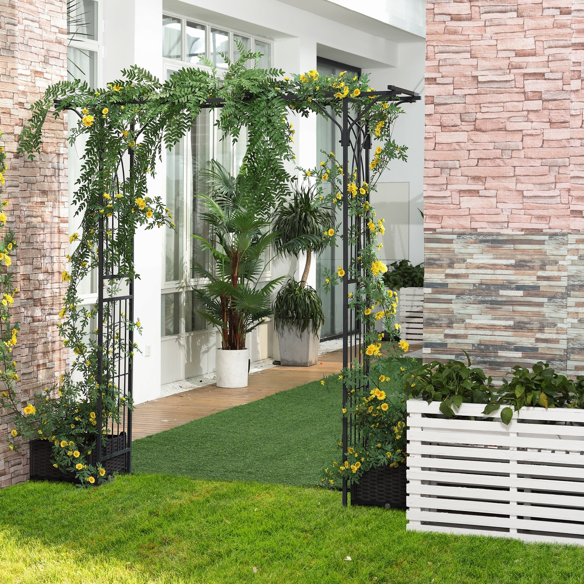 Black metal arbor with elegant scrollwork and climbing vines showcasing rustic charm for garden and weddings