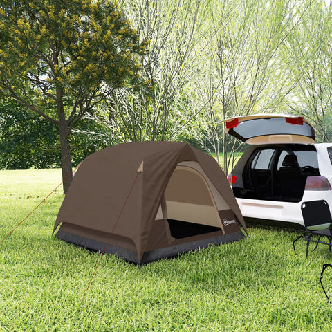 Brown and beige outsunny dome tent with mesh windows and dark gray base set up on grass near a white car