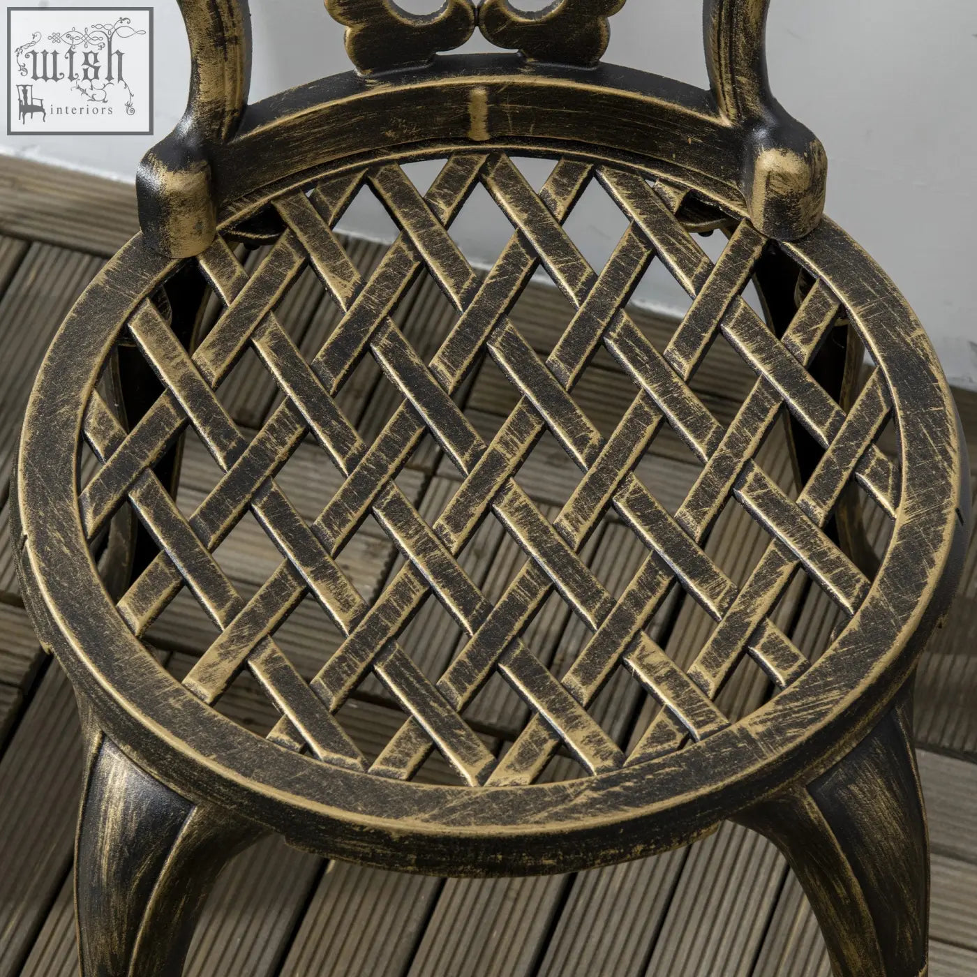 Antique bronze cast aluminium bistro set chair with woven lattice seat and ornate scrollwork backrest for outdoor use