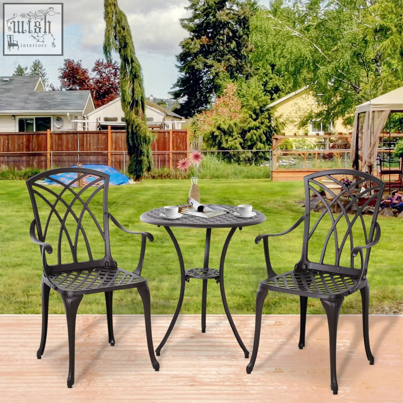 Black cast aluminium garden furniture set with intricate lattice backrests and round table with parasol hole brown
