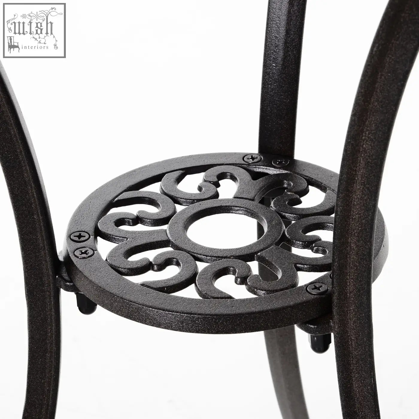 Black wrought iron circular plant stand with ornate scrollwork design in cast aluminium garden furniture set brown