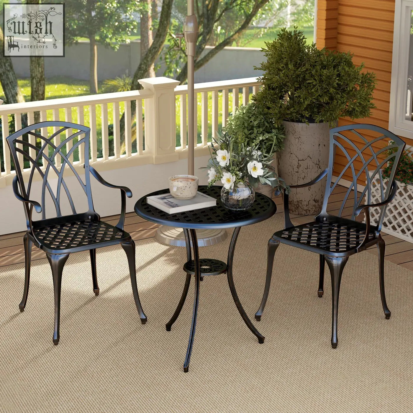Black wrought iron cast aluminium garden furniture set with lattice backrests and mesh seats for outdoor dining