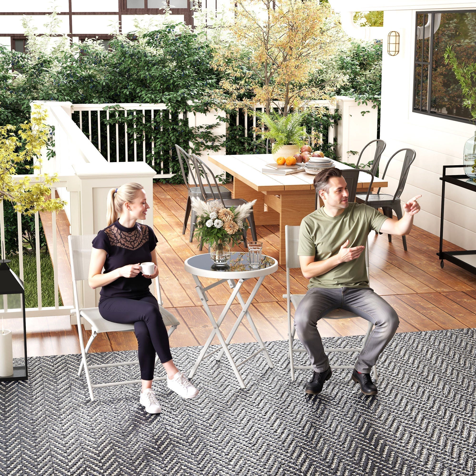 Gray and white herringbone outdoor rug under outsunny 3 pieces outdoor bistro set with tempered glass top and breathable mesh chairs