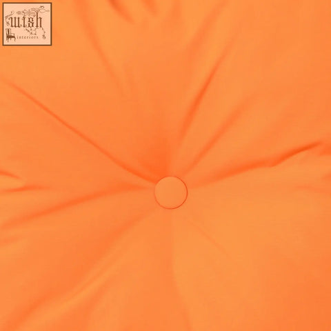 Bright orange tufted cushion with central button for outsunny rattan bistro set and storage coffee table outdoor use