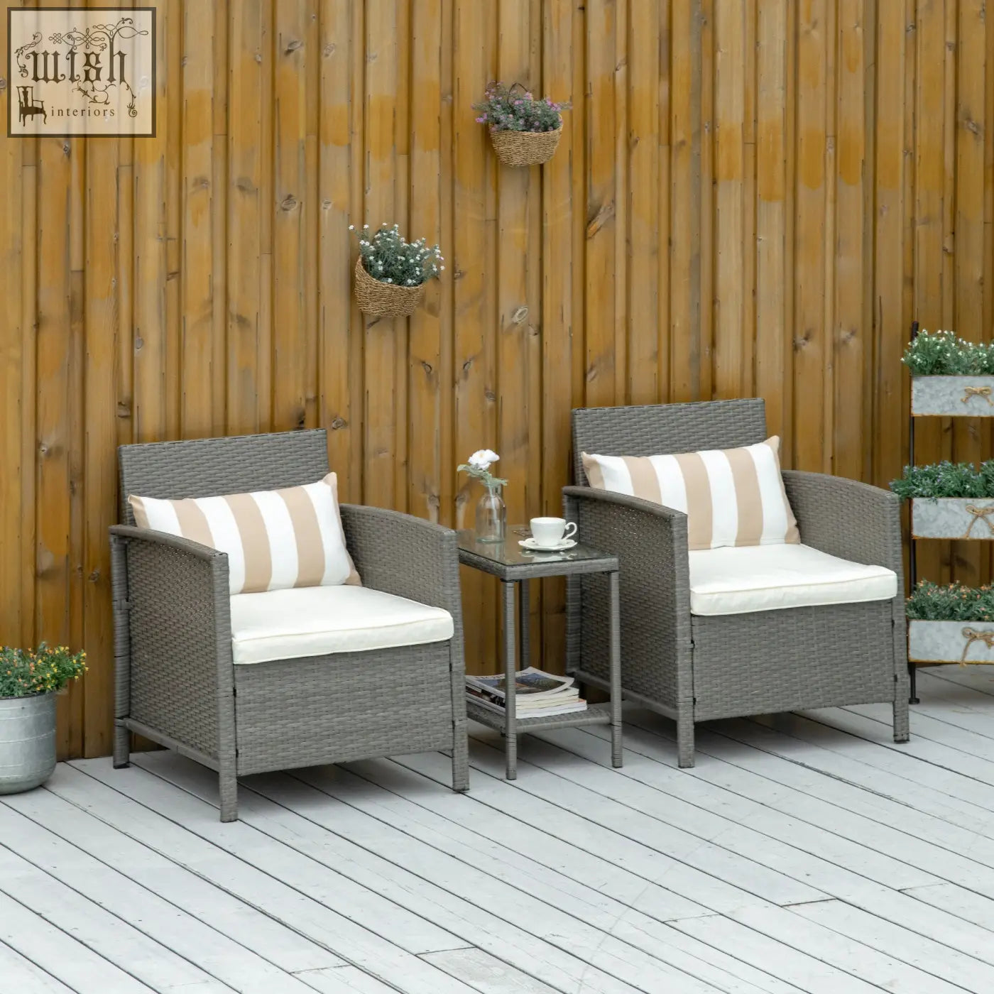Gray wicker patio chair with white cushion and stylish striped bolster cushion from outsunny rattan bistro set