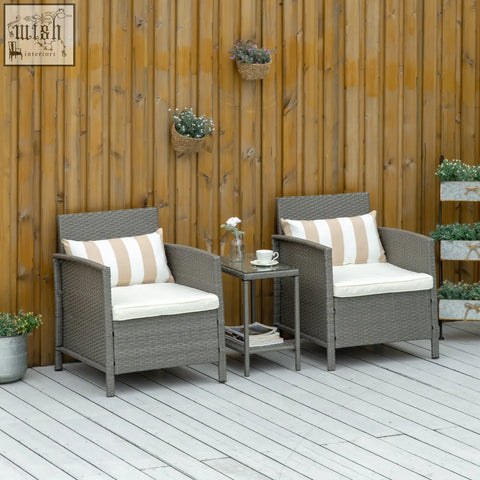 Gray wicker patio chair with white cushion and stylish striped bolster cushion from outsunny rattan bistro set