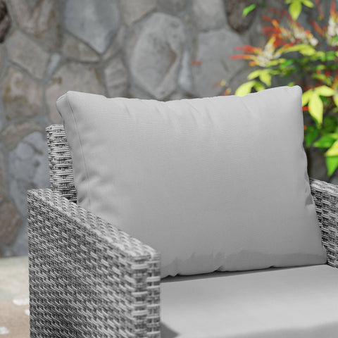 Light gray cushion with soft plush texture on woven wicker chair in outsunny rattan bistro set for outdoor patio
