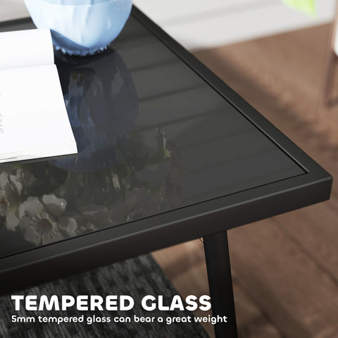 Black tempered glass coffee table with sleek modern frame in grey rattan bistro set for outdoor patio use