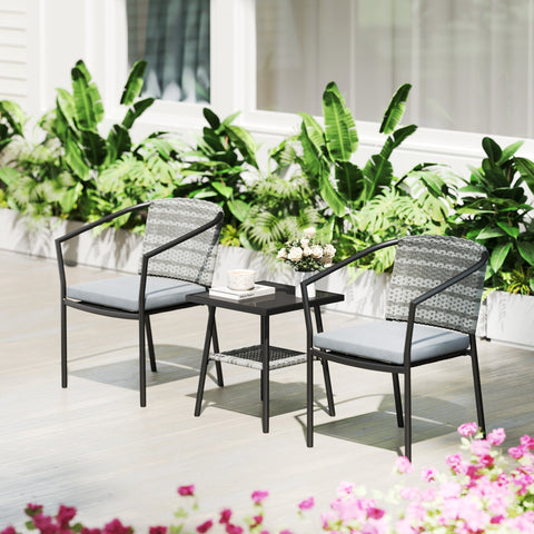 Modern gray woven rattan bistro set with black metal frames and light gray cushions for outdoor patio use