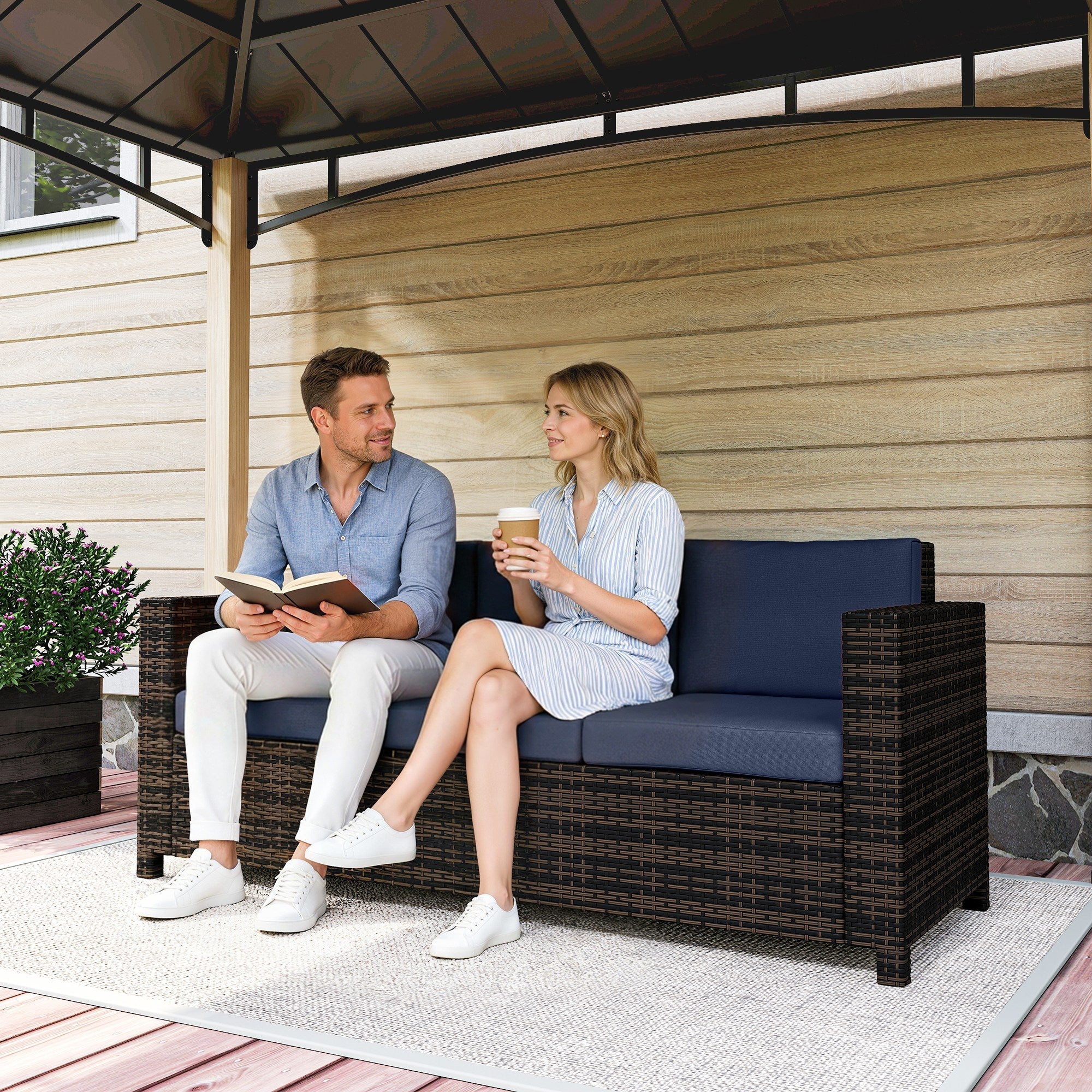 Outsunny dark brown rattan sofa for three persons with navy blue fire resistant cushions and all-weather wicker weave