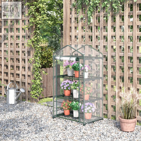 Green metal framed greenhouse with clear plastic cover, three wire shelves, and roll up door 69l x 49w cm