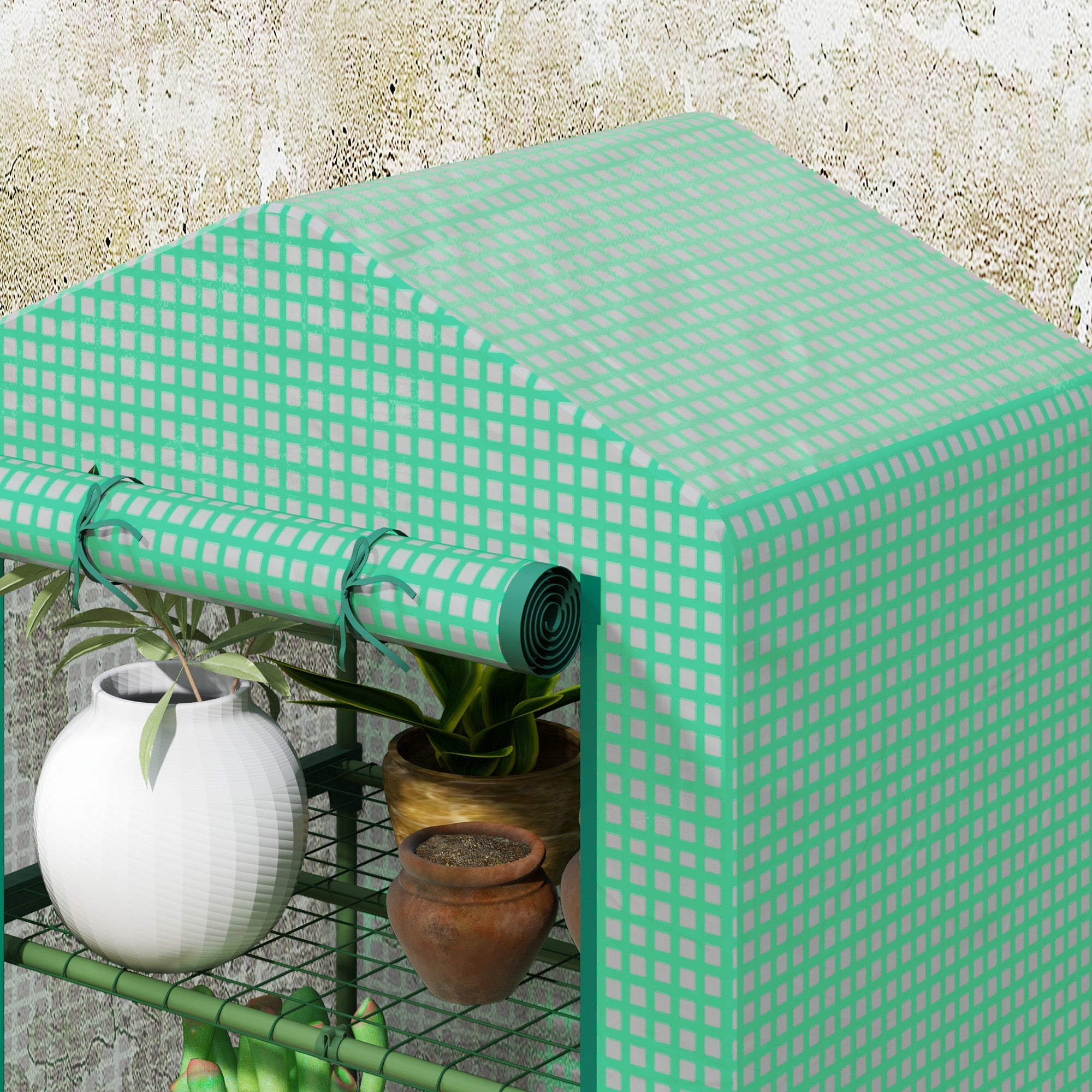 Outsunny 3 tier mini greenhouse with mint green plastic cover, roll-up door, and metal wire shelves for potted plants