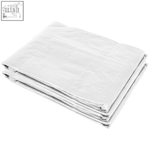 White folded fabric tarp with subtle grid pattern for outsunny greenhouse cover offers easy access against light rain and wind