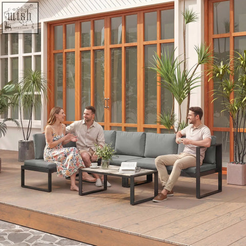 Modern outdoor garden sofa set with dark gray cushions and powder-coated steel frame includes coffee table for balcony