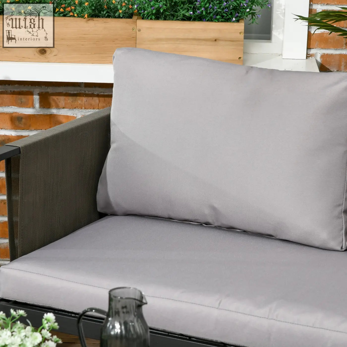 Gray fabric cushion and seat pad on two-seater sofa from outsunny metal garden set with tempered glass coffee table