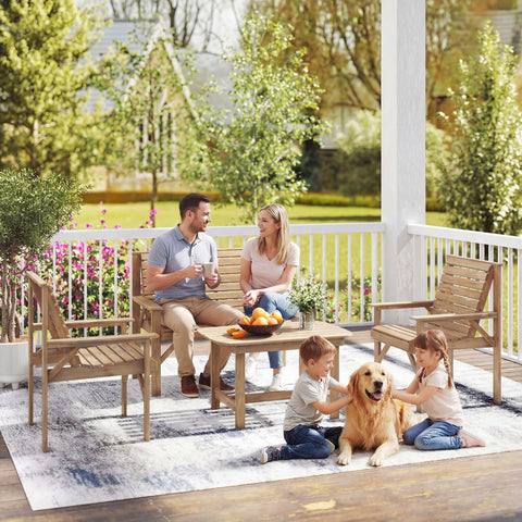 Light brown natural wood furniture set with slatted seats and backs including coffee table for outdoor use