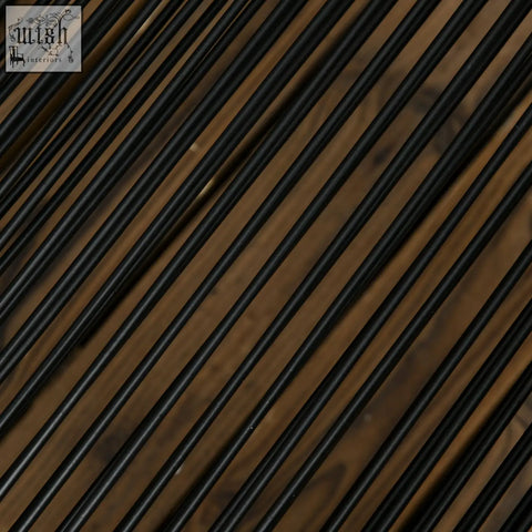 Black cylindrical rods arranged diagonally on wooden surface in a seater rattan cube garden furniture set