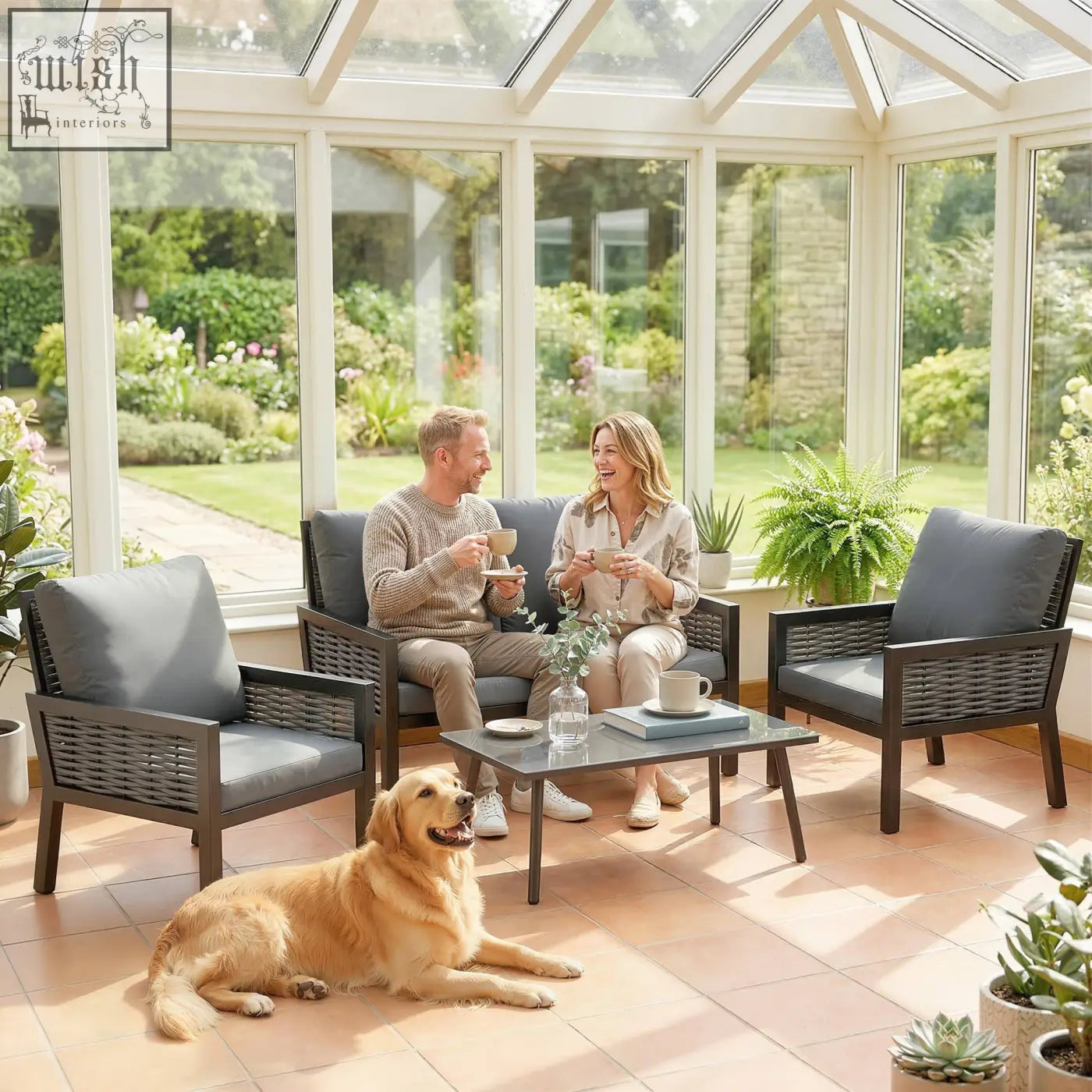 Dark gray woven rattan garden furniture set with cushions including loveseat, 2 armchairs, and coffee table for patio use