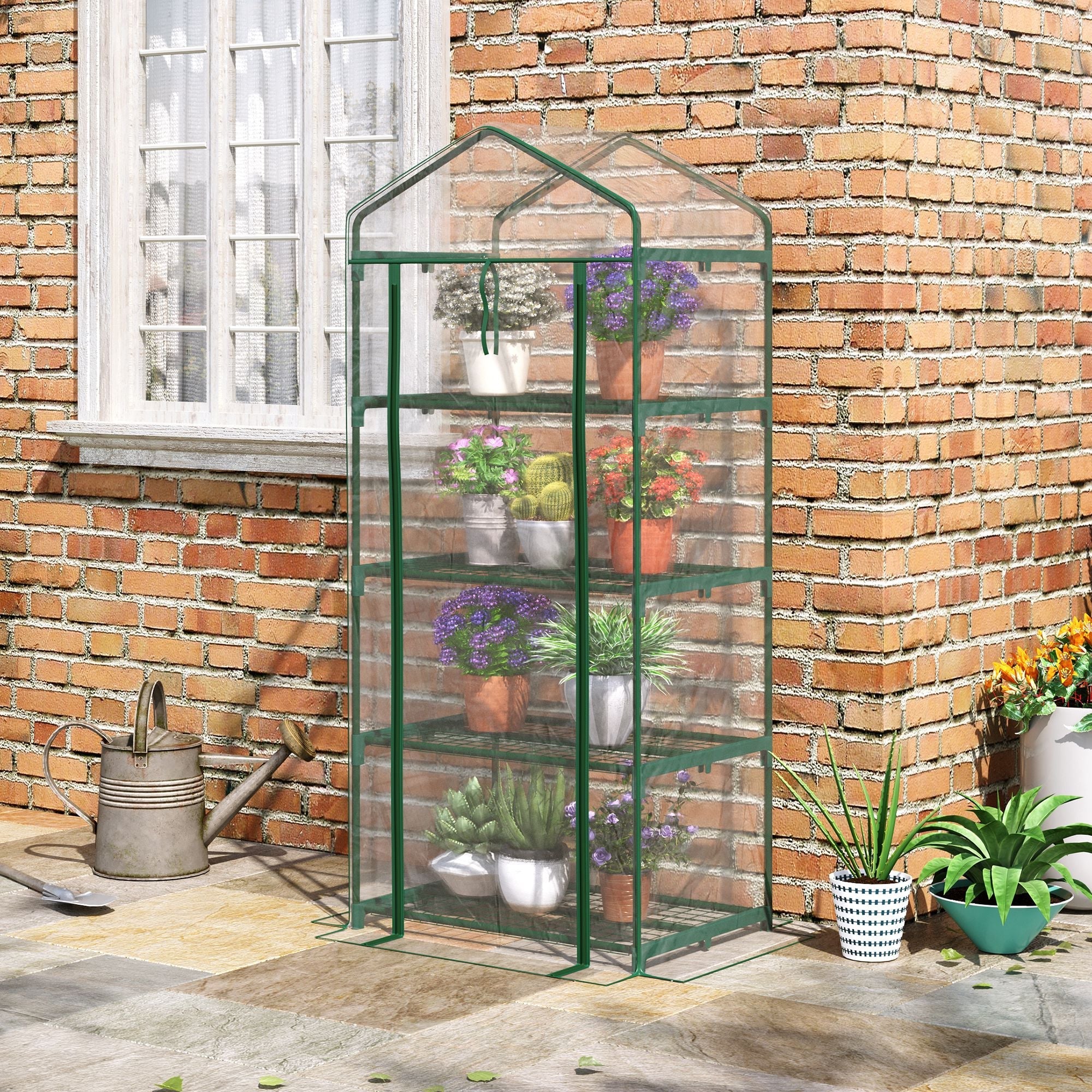 Green metal framed outsunny mini portable greenhouse with four inside shelves and powder coated steel frame with pvc cover